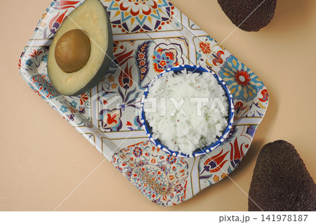 Avocado avocado scrub on a decorative plate 141978187