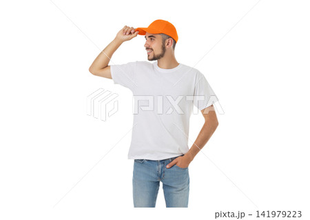 Young man poses with t-shirt and cap for design, PNG 141979223