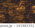 Semi-blurred rust dark golden brown abstract grunge background. Organic mottled patterns reminiscent of weathered parchment, oxidized metal, or aged vintage leather 141983352