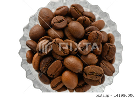 Overhead Close-Up View of Roasted Coffee Beans in a Crystal Bowl Overhead Close-Up View of Roasted Coffee Beans in a Crystal Bowl 141986000