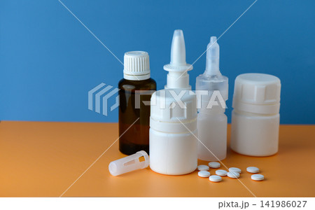 Various health products showcase vibrant colors and textures on a bright orange and blue background, emphasizing their importance in wellness routines Various health products showcase vibrant colors and textures on a bright orange and blue background, emphasizing their importance in wellness routines 141986027