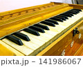 Close-Up View of Harmonium Keys and Wooden Body 141986067