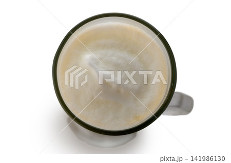 Top view of latte macchiato coffee with creamy milk foam in a glass mug Top view of latte macchiato coffee with creamy milk foam in a glass mug 141986130