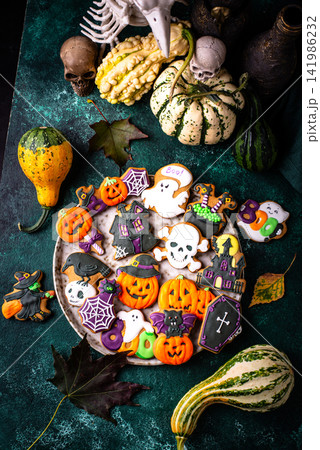 Halloween cookies in shape of ghost, jack-o-lantern and skull Halloween cookies in shape of ghost, jack-o-lantern and skull 141986232