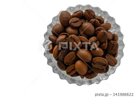 Overhead View of Roasted Coffee Beans in an Ornate Glass Bowl Overhead View of Roasted Coffee Beans in an Ornate Glass Bowl 141986622