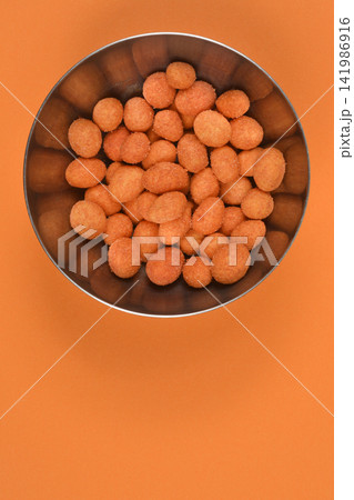 Savory Peanuts on Orange Savory Peanuts on Orange 141986916
