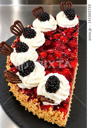 Berry cake with whipped cream, blackberries, raspberries and chocolate Berry cake with whipped cream, blackberries, raspberries and chocolate 141989729