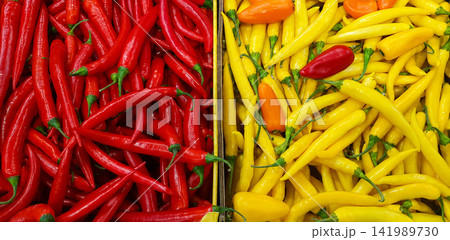 Fresh Red and Yellow Peppers at Market, Colorful Pepper Background Fresh Red and Yellow Peppers at Market, Colorful Pepper Background 141989730