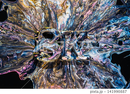 dynamic abstract fluid art flowing and mixing in vibrant colors on dark background. dynamic abstract fluid art flowing and mixing in vibrant colors on dark background. 141990887