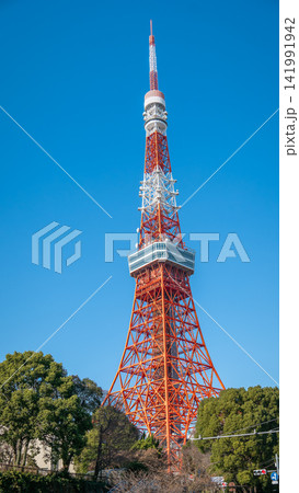 Tokyo Tower under Clear Blue Sky in Tokyo, Japan Tokyo Tower under Clear Blue Sky in Tokyo, Japan 141991942