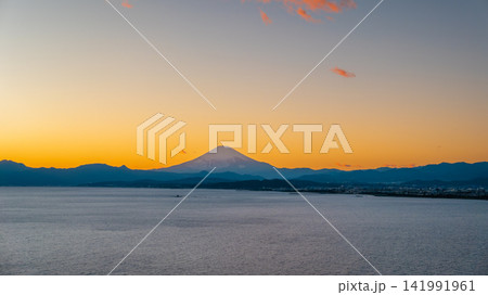 Mount Fuji view from Sagami Bay at sunset in Kanagawa, Japan Mount Fuji view from Sagami Bay at sunset in Kanagawa, Japan 141991961