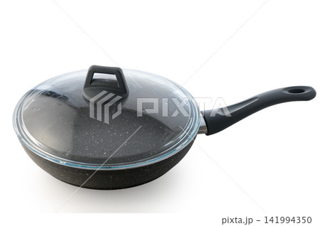 Cookware with a sleek design and a glass lid for versatile culinary adventures in the kitchen Cookware with a sleek design and a glass lid for versatile culinary adventures in the kitchen 141994350