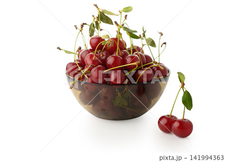 Bowl of Fresh Red Cherries with Stems and Leaves Bowl of Fresh Red Cherries with Stems and Leaves 141994363