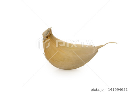 Single Baked Garlic Clove on White Single Baked Garlic Clove on White 141994631