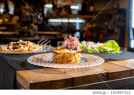 Gourmet dish on restaurant table Gourmet dish on restaurant table 141997322