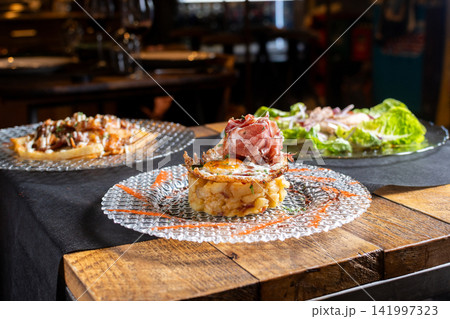 Gourmet dish on restaurant table Gourmet dish on restaurant table 141997323