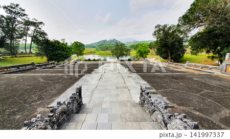 Landscape Of Courtyard And Mountain In Font Of Mausoleum Of King Gia Long (Also Called Thien Tho Mausoleum) In Hue, Vietnam.  141997337