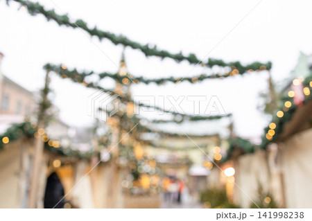 Cozy Christmas market streets with festive garlands in Krakow Poland 141998238