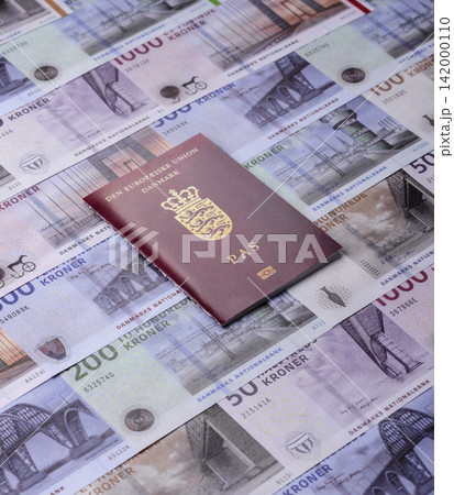 Denmark, Danish passport or id document with tickets for flight, travel. Danish passport Denmark, Danish passport or id document with tickets for flight, travel. Danish passport 142000110