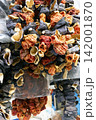 Traditional Healthy Snacks and Fresh Produce at an Outdoor Market 142001870