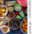 Traditional Healthy Snacks and Fresh Produce at an Outdoor Market 142001886