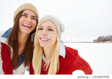 Snow, love and lesbian couple outdoor in winter on romantic vacation, adventure or holiday. Happy, smile and queer women in relationship for fun and bonding in cold weather on weekend trip in Canada Snow, love and lesbian couple outdoor in winter on romantic vacation, adventure or holiday. Happy, smile and queer women in relationship for fun and bonding in cold weather on weekend trip in Canada 142004590