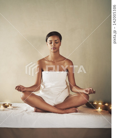 Meditation, wellness and yoga with black woman in spa to relax for mental health, peace or zen. Beauty, lotus and mindfulness with customer person in towel at luxury resort for natural therapy Meditation, wellness and yoga with black woman in spa to relax for mental health, peace or zen. Beauty, lotus and mindfulness with customer person in towel at luxury resort for natural therapy 142005386