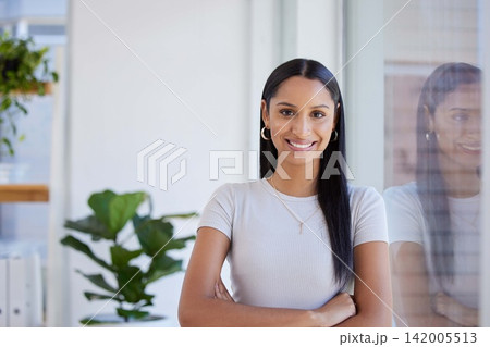 Portrait, smile and business woman with arms crossed in office for career, job or pride in startup company in Dubai. Face, confident professional and happy creative entrepreneur, worker or editor Portrait, smile and business woman with arms crossed in office for career, job or pride in startup company in Dubai. Face, confident professional and happy creative entrepreneur, worker or editor 142005513