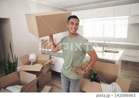 Happy man, moving and carry box in new house for property, investment and real estate in living room. Male person, smile and laugh in apartment for immigration, travel and relocate to Los Angels 142006063