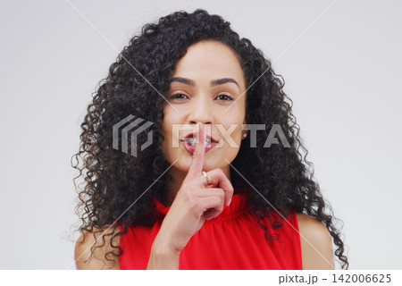 African woman, portrait and finger with hush, studio and silence for mystery announcement. Model, gossip and secret with rumor, whisper and gesture for news or noise with privacy on white background African woman, portrait and finger with hush, studio and silence for mystery announcement. Model, gossip and secret with rumor, whisper and gesture for news or noise with privacy on white background 142006625