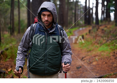 Hiking, backpack and man in forest for survival, shelter and dangerous conditions. Nature, winter and male person with trekking pole in rough environment, immigration and safe destination in Europe Hiking, backpack and man in forest for survival, shelter and dangerous conditions. Nature, winter and male person with trekking pole in rough environment, immigration and safe destination in Europe 142006850