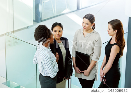 Top view, collaboration and communication in corporate meeting for finance report, diversity and strategy while brainstorming. Teamwork, business women and discuss project in office, idea or planning Top view, collaboration and communication in corporate meeting for finance report, diversity and strategy while brainstorming. Teamwork, business women and discuss project in office, idea or planning 142006982