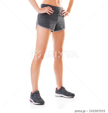 Fitness, workout and legs of woman on a white background for marathon training, exercise and running. Sports, athlete and isolated person in sneakers for wellness, health and performance in studio Fitness, workout and legs of woman on a white background for marathon training, exercise and running. Sports, athlete and isolated person in sneakers for wellness, health and performance in studio 142007035