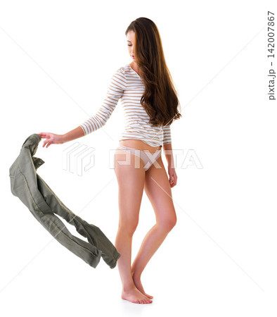 Woman, undress and remove in studio, underwear and healthy body on gray background. Female person, jeans and panties of lingerie for fashion, clothes and designer bikini or wellness on mockup space 142007867