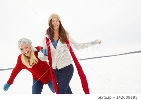 Snow, smile and lesbian with girl outdoor in winter on romantic vacation, adventure or holiday. Love, happy and queer women couple in relationship for bonding in cold weather on trip in Germany. Snow, smile and lesbian with girl outdoor in winter on romantic vacation, adventure or holiday. Love, happy and queer women couple in relationship for bonding in cold weather on trip in Germany. 142008195