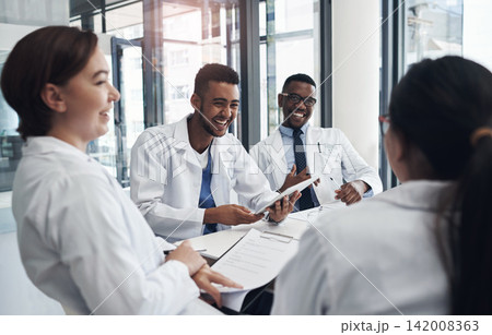 Meeting, teamwork and nurses with doctors in office for medical treatment, diagnosis or surgery in clinic. Discussion, documents and group of surgeons with healthcare paperwork in medicare hospital. 142008363