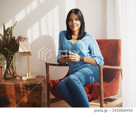 Portrait, smartphone and woman on sofa for networking, social media or mobile app in lounge. Home, relax and female person with phone on couch for communication, browsing internet or reading news Portrait, smartphone and woman on sofa for networking, social media or mobile app in lounge. Home, relax and female person with phone on couch for communication, browsing internet or reading news 142008450