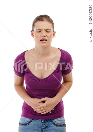 Woman, hands and stomach ache in studio with pain, health issue and infection. Sickness, abdomen and isolated female person by white background for medical problem with gastro, constipation and uti 142008586