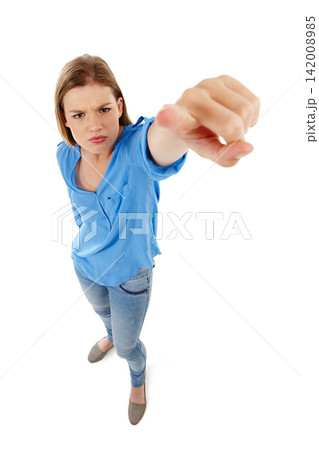 Portrait, top view and woman pointing to space, angry and girl on white studio background. Face, female or teenager with gesture for blame, upset and nagging with problems, frustrated and bossy Portrait, top view and woman pointing to space, angry and girl on white studio background. Face, female or teenager with gesture for blame, upset and nagging with problems, frustrated and bossy 142008985