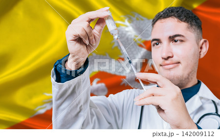 Doctor holding syringe on Bhutan flag background. Medical professional holding syringe with Bhutanese flag in the background 142009112