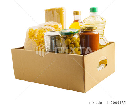Foodstuffs in donation box for volunteer to help people. Foodstuffs in donation box for volunteer to help people. 142009185
