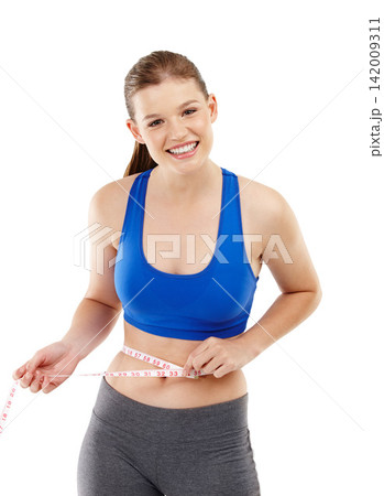 Portrait of girl, smile and measuring tape in studio for measurement, happy and excited for results of diet. Female person, body and care for calories target, weight loss and white background Portrait of girl, smile and measuring tape in studio for measurement, happy and excited for results of diet. Female person, body and care for calories target, weight loss and white background 142009311