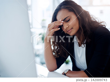 Business woman, computer and headache with stress, debt or mistake in burnout at office. Frustrated female person or employee with migraine, anxiety or depression in financial crisis at workplace 142009743