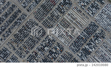 Aerial view new car lined up, Automobile automotive car parking lot commercial business industry,  Port of import export business logistic dealership, New cars global business logistic import export. 142010080