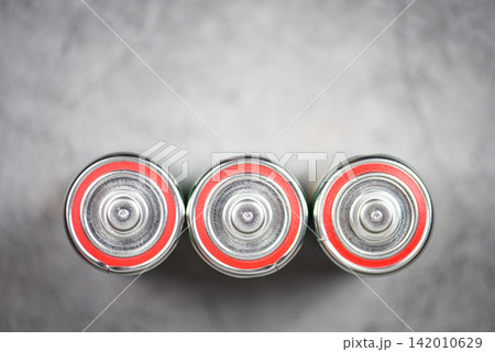 alkaline batteries on top view - close up battery D size , selective focus alkaline batteries on top view - close up battery D size , selective focus 142010629