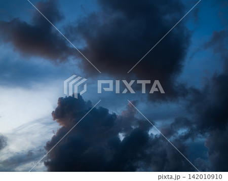 Cloud storm sky dark halloween background rain lightning thunder stoumy typhoon Nature light scene rainy atmosphere damage effect carbon dioxide dust air pollution 2.5 Pm, texture nature windstorm. Cloud storm sky dark halloween background rain lightning thunder stoumy typhoon Nature light scene rainy atmosphere damage effect carbon dioxide dust air pollution 2.5 Pm, texture nature windstorm. 142010910