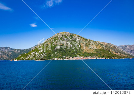 Coastal town under mountain in Kotor Bay Coastal town under mountain in Kotor Bay 142013872