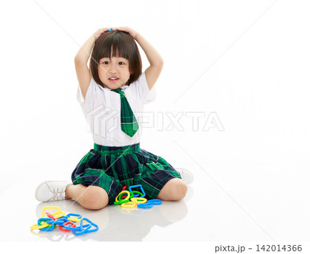 Surprised Asian Little Girl Playing Building Blocks Toy Showing Shocked Expression Isolated on White Background Surprised Asian Little Girl Playing Building Blocks Toy Showing Shocked Expression Isolated on White Background 142014366