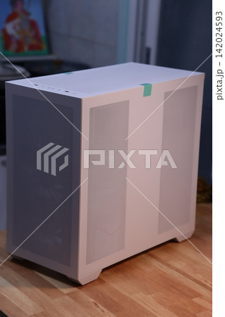 Modern Air Purifier Unit on Wooden Surface Modern Air Purifier Unit on Wooden Surface 142024593