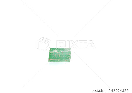 green tourmaline mineral stone macro on white background green tourmaline mineral stone macro on white background 142024829